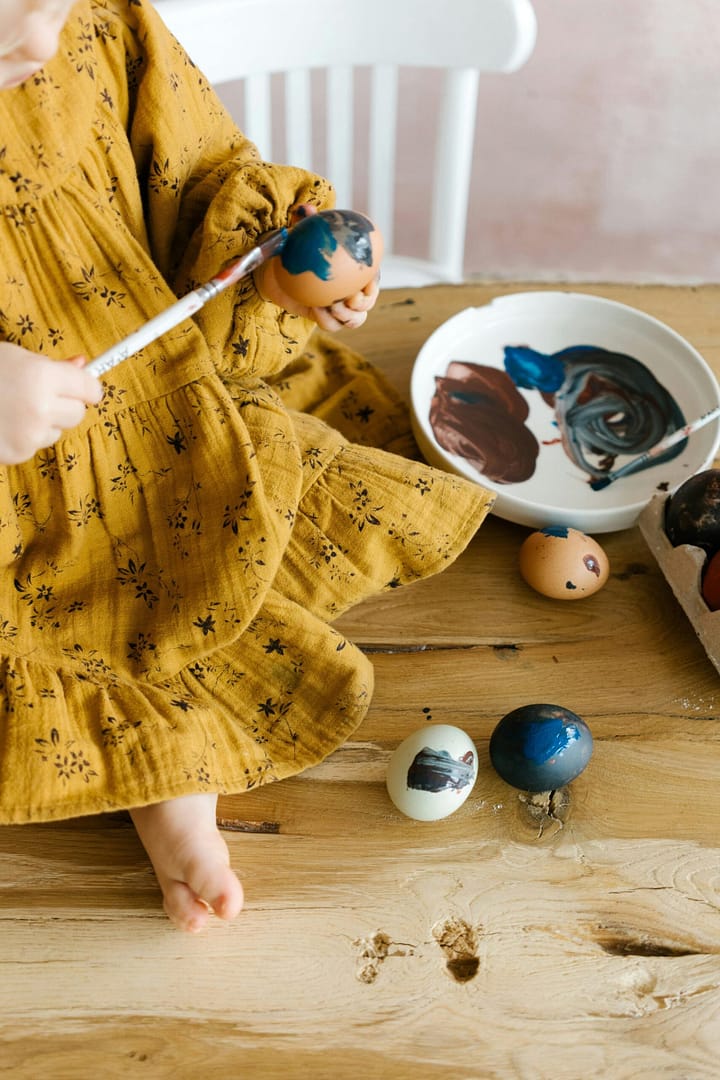 Funny parenting advice: let your child paint the Easter Eggs. You will finally be able to drink that coffee you made hours ago