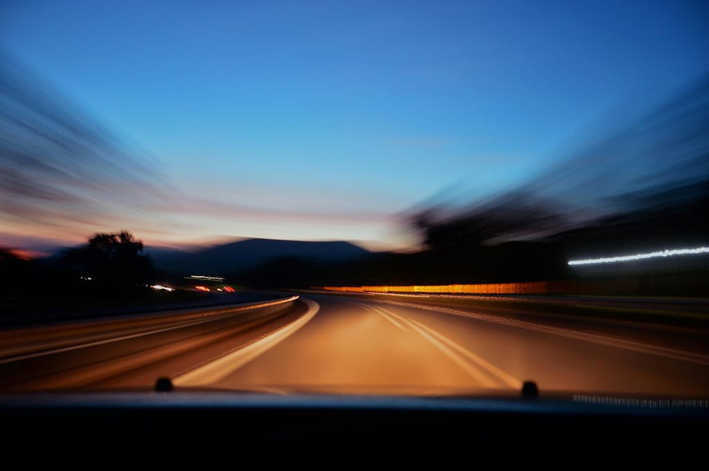 A vehicle driving on the highway as a representation of the racing thoughts at night