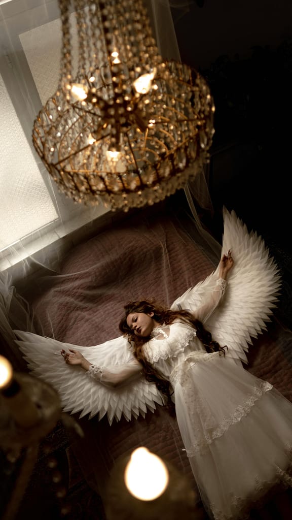A woman envisioned as an angel, which is a common dream symbol in different religions