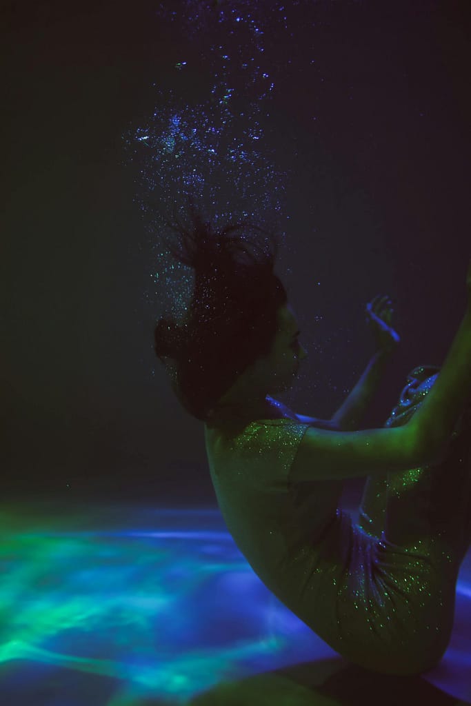 How to dream like a pro - a woman falling asleep feels like falling in deep dark water