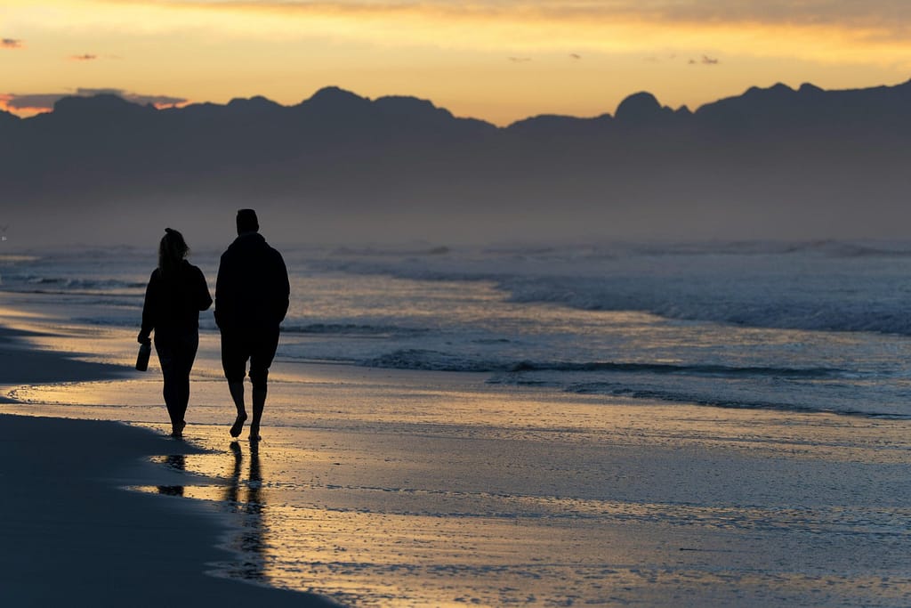 A couple enjoying a slow mornings routine at the beach