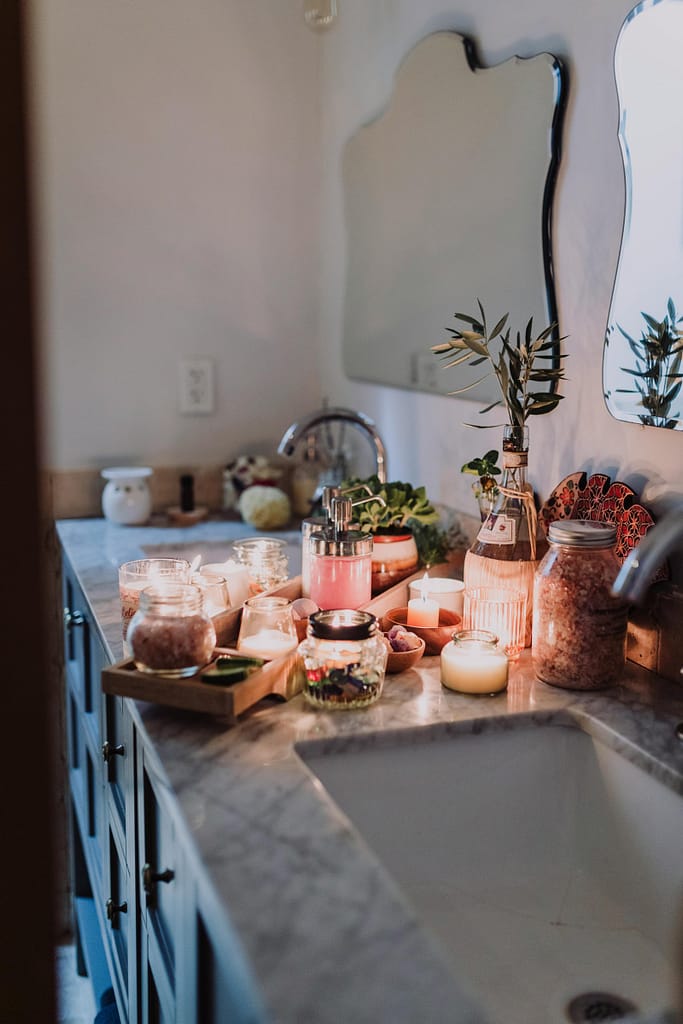 An image of products for these nighttime rituals before bed and manifest while you sleep.