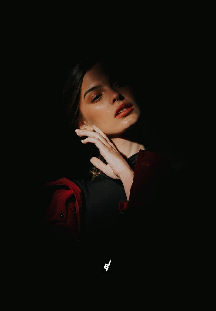 A beautiful woman staring her glaze at an unknown subject